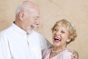 Old Couple Smiling and Embracing