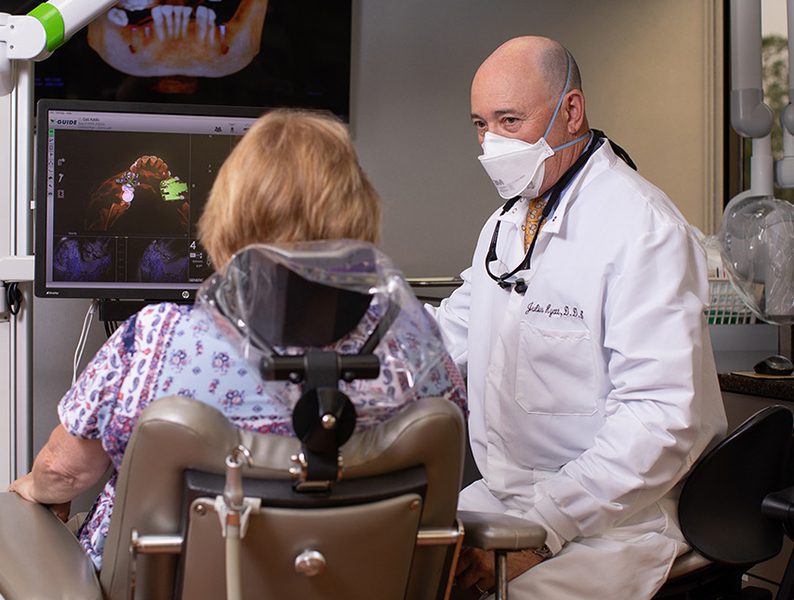 Dr. Hyatt with patient at Maryland Center for Oral Surgery & Dental Implants. 