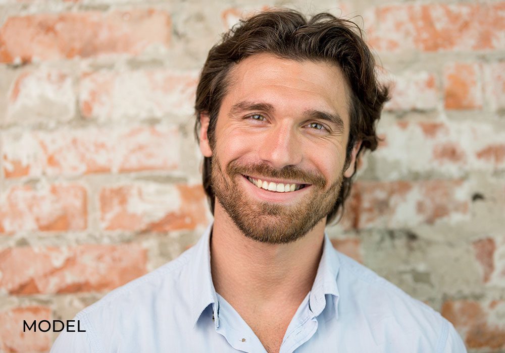 Smiling Male Model for Dental Implants